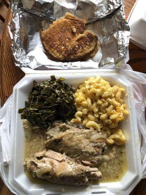 Turkey wings with rice "extra gravy" , collard greens, Macaroni and cheese and cornbread.