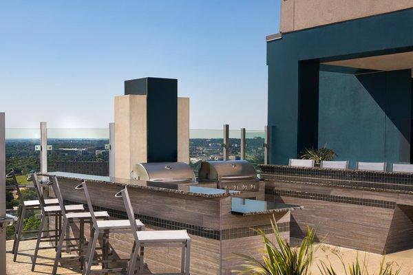 Built-in outdoor kitchen with BBQ grills