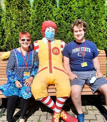 Volunteers smiling with Ronald McDonald at the Cleveland Ronald McDonald House