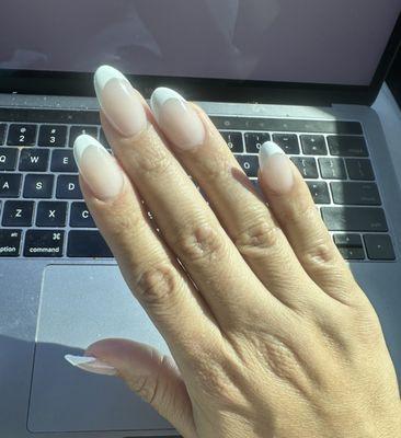 Acrylic almond shape nails with white gel tip