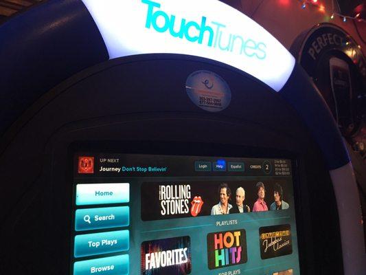 TouchTunes featuring "Cowboy Joe" and the rockin' Rolling Stones.