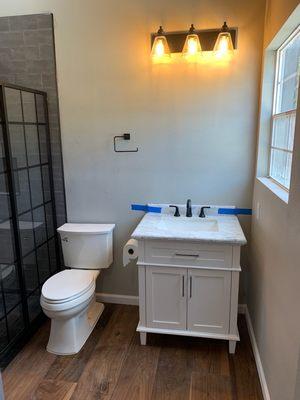 Interior finished out bathroom in steel building.