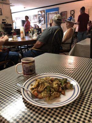 Veggie scramble, hot coffee, friendly locals and service with a smile.