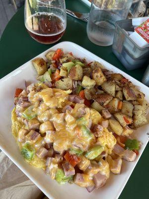 Denver scramble, loaded home potatoes and a pomegranate mimosa