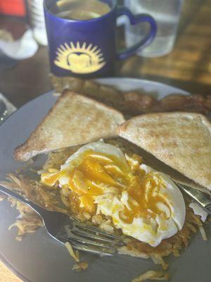 2 poached eggs I added on top of hash browns bacon and toast.