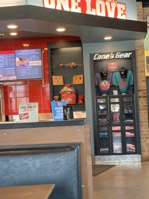 Front counter area with merchandise to purchase at Raising Cane's in Wichita Falls Texas.