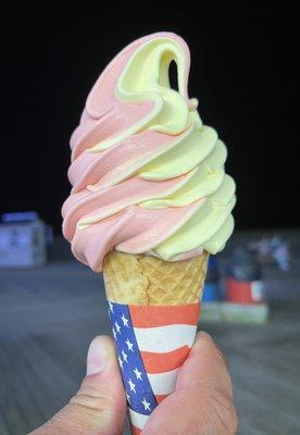 Strawberry Banana Twist on a sugar cone