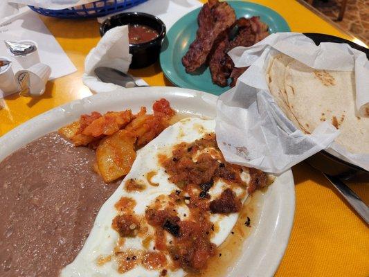 Had the most amazing  huevos rancheros this morning for breakfast I  Oh let's not fail to mention the homemade tortillas  where the bomb!!!!