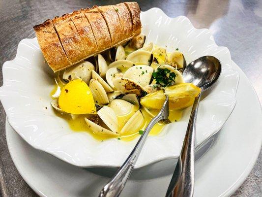 Steamed Clams Prepared in a Garlic, Lemon, Fresh Herb, Whole Grain Mustard, & Butter Broth