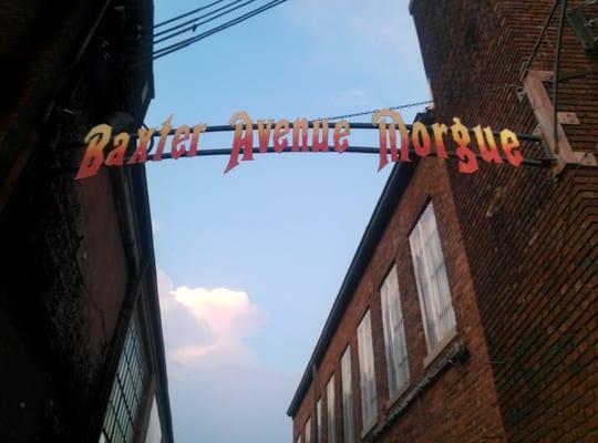 The sign over the alley.