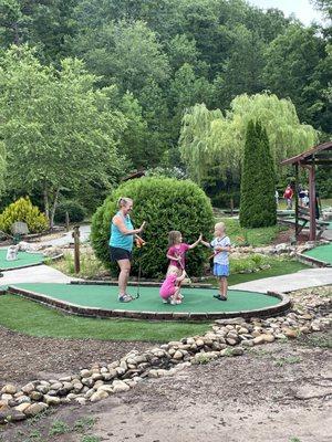 High fives all around for this trio of putt putters!