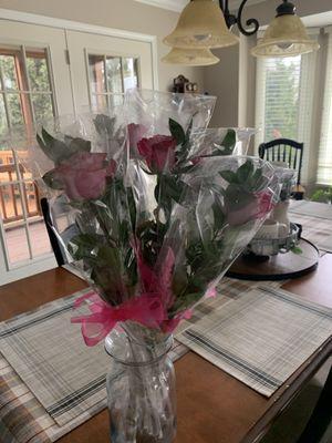 Beautiful individually wrapped purple roses for Senior night at school.