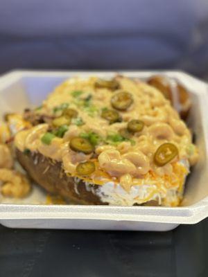 Loaded baked potato with pulled pork and mac n cheese !