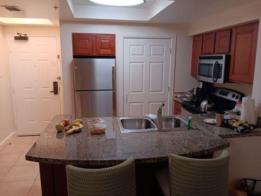 Fully stocked kitchen, with washer & dryer.