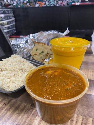 Chicken curry, mango lassi, garlic naan, and basmati rice