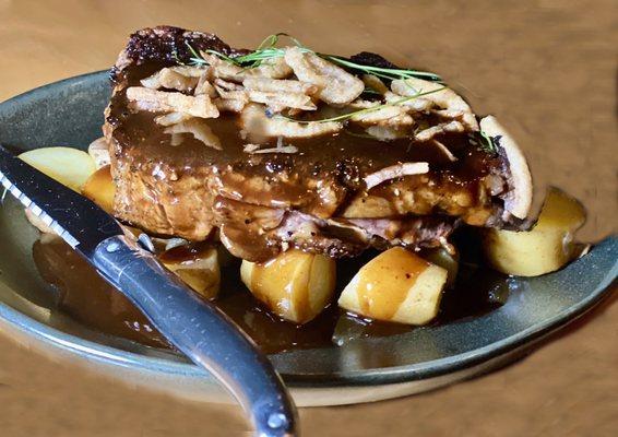 16 oz Cab New York strip with fingerling potatoes and brandy au- poivre with crispy onions on top.