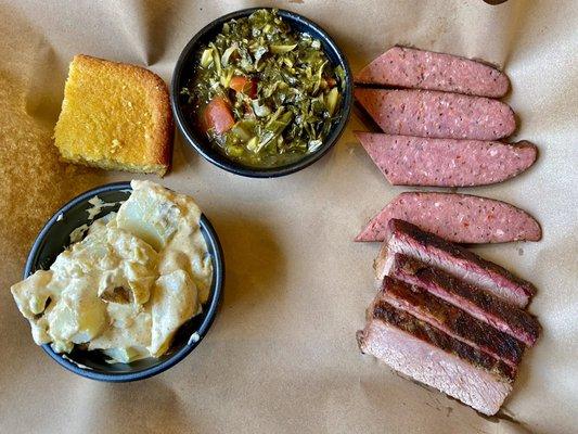 2 meats (sausage & brisket), 2 sides (collards, potato salad), corn bread, & 1 drink.