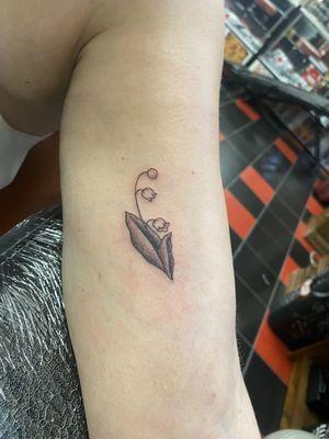 Lily of the valley flower tattoo by Kelly