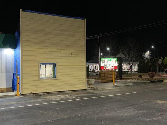 Exterior drive thru pick up window and sign