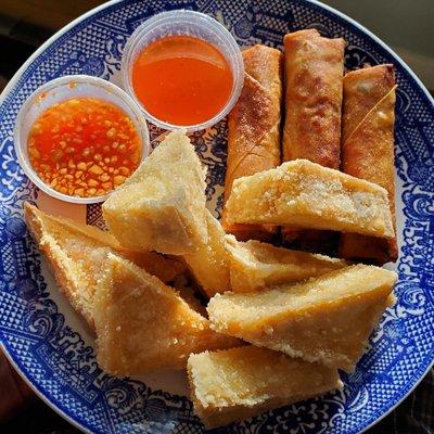 Pillowy and delicious fried tofu, and spring rolls, with sauces that may be bright orange, but are actually yummy!