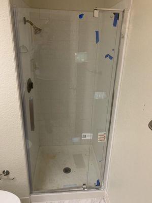 Shower door installation