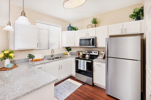 Kitchen with stainless steel appliances at Broadstone Desert Sky