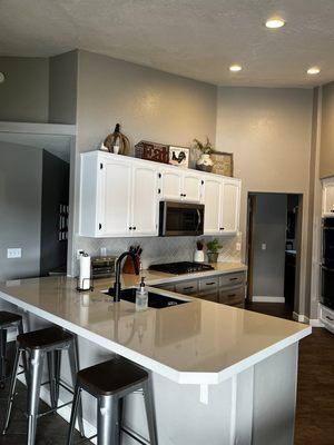 Linea quartz and Portico Pearl backsplash.