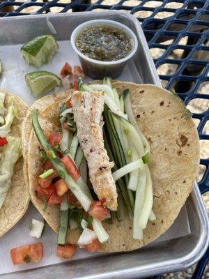 Fish taco, with tiny strip of "fish" and mostly cucumber.