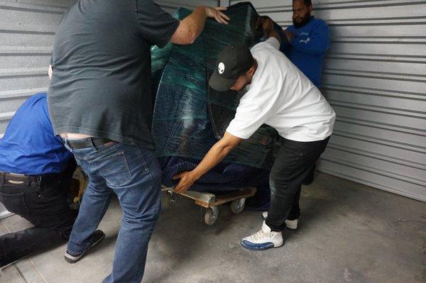 How NOT to Crate & Move a Baby Grand Piano, by Stewart Moving. We provided the plastic and the trolley.