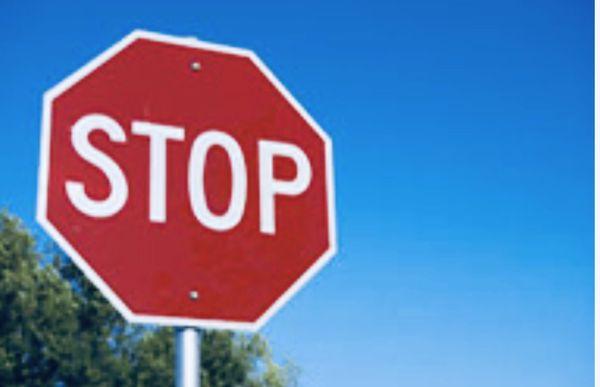 Come to a complete stop at all stop signs then inch forward forward to see!