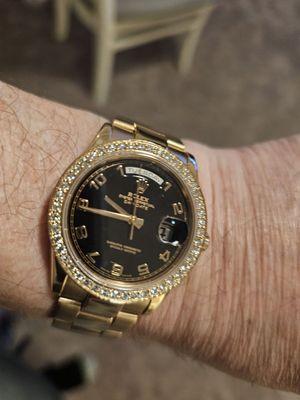 My 2005, 18Kt Rose Gold Oyster Perpetual Day Date Presidential Rolex Gold watch after the Gold Diamonds bezel installation.