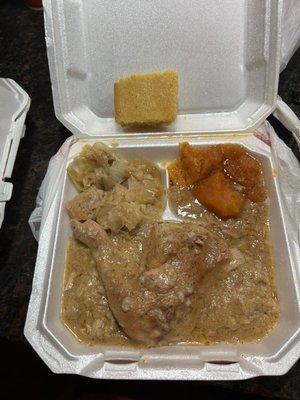 Baked chicken, cornbread dressing, cabbage and yams.