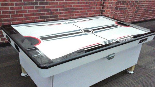 Air hockey anyone? No, sorry..the motor barely puts out air. Broken, much like barely functional pool table.