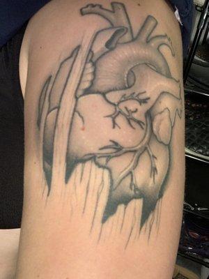 Tattoo on upper left arm