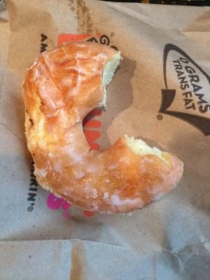 Come on Dunkin, I know they're delicious, but please don't eat my donut before putting it in the bag.