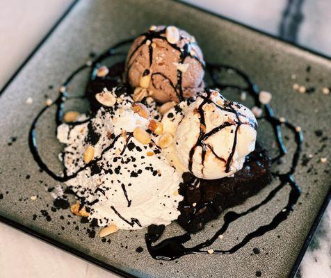 Warm Brownie Sundae with chocolate and vanilla ice cream, chocolate sauce, peanuts at Pacific Standard Prime steakhouse in Redondo Beach