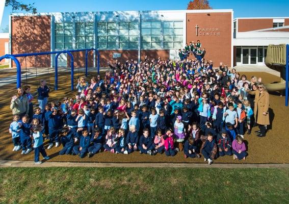 Our school family showing their spirit in front of the school at our playground