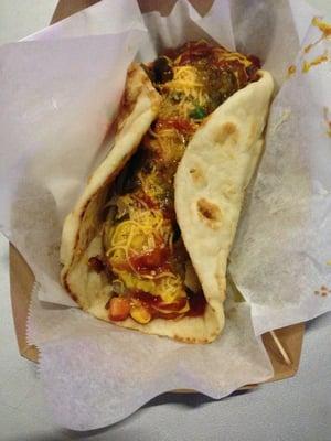 Bratwurst wrapped in flatbread.