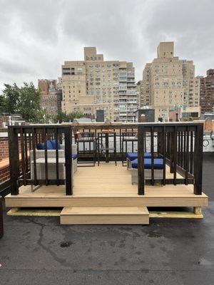 Deck after staining and sealing the railings