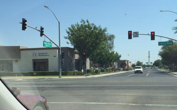 On the corner of Lacey Blvd and Mall Dr (across the street from Applebee's)