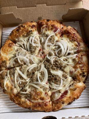 Small Hamburg and onion pizza.