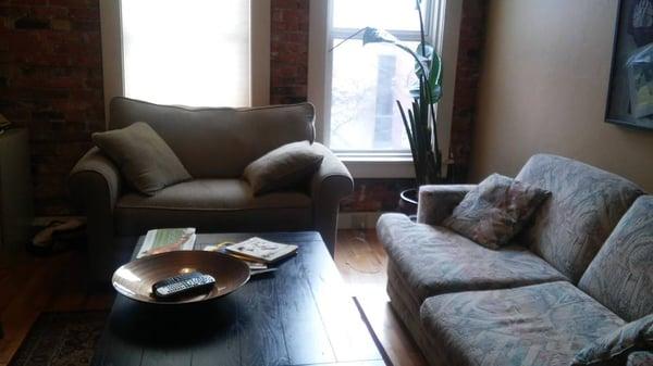 The cozy waiting room; coffee, tea, great magazines and even a flat screen TV.