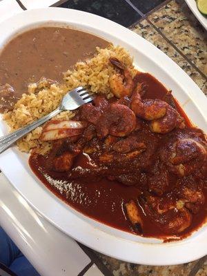 Can't remember the name of this dish, but it was fish, shrimp w/ octopus smothered in diabla chili sauce, with a side of frijoles and rice