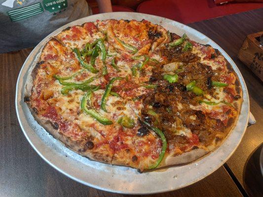 Pizza with green pepper and caramelized onion