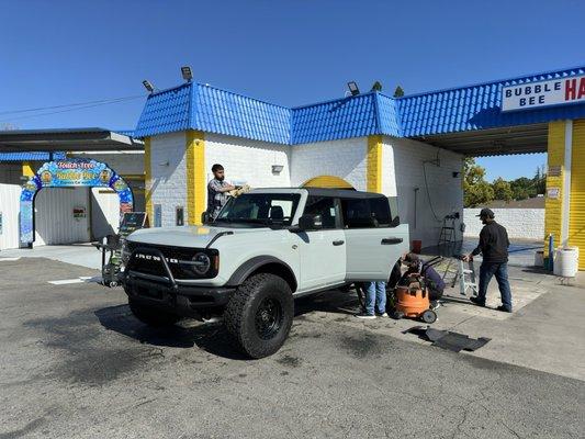 My truck being pampered by friendly staff.