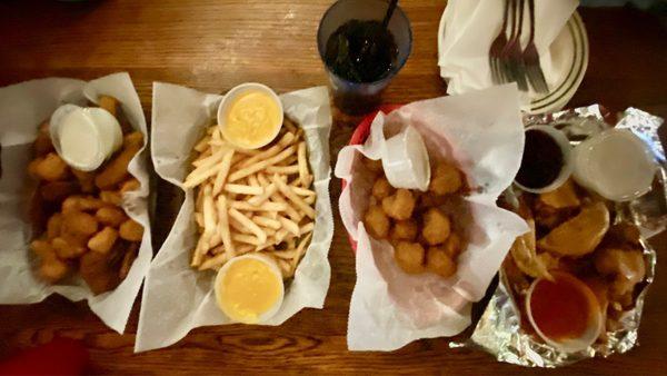 (Left to Right) Combo Basket,  Cheese Fries,  Breaded Mushrooms,  Wings