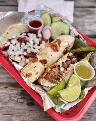 Front to back: birria taco, taco arabe, pastor taco