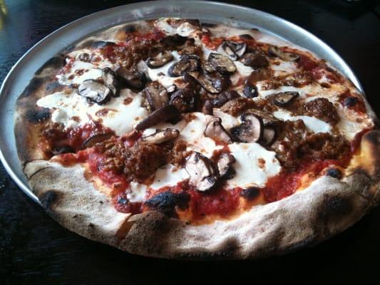 Sausage pizza with crimini mushrooms