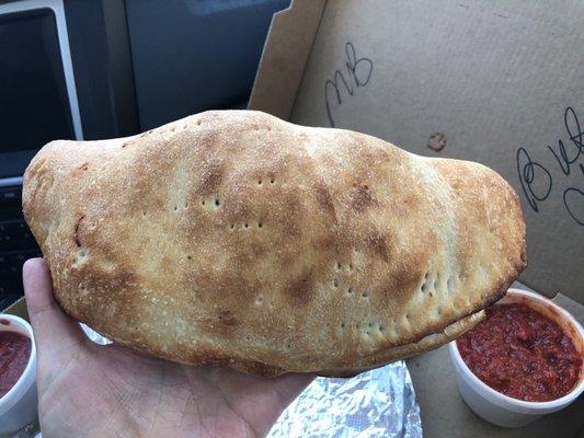 Huge meatball cheese calzone