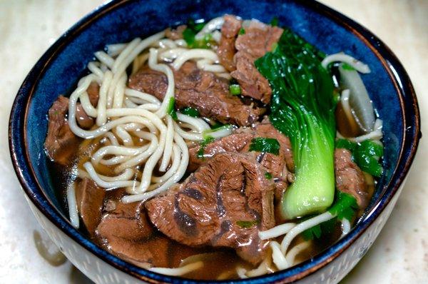 Beef Pulled Noodles (牛肉拉麵): $7.50. Take-out photo -- shown with a few noodles and most of the beef from one order.